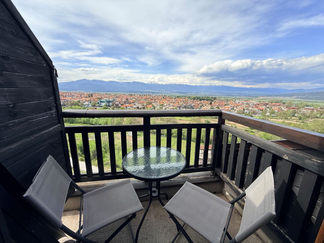 All Seasons Club Bansko penthouse north balcony with views over Bansko to Rila